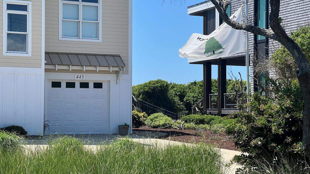 The “Appeal to Heaven” flag flying outside a Carteret County beach home owned by Macon Newby, the wife of North Carolina Supreme Court Chief Justice Paul Newby, on May 23, 2024.