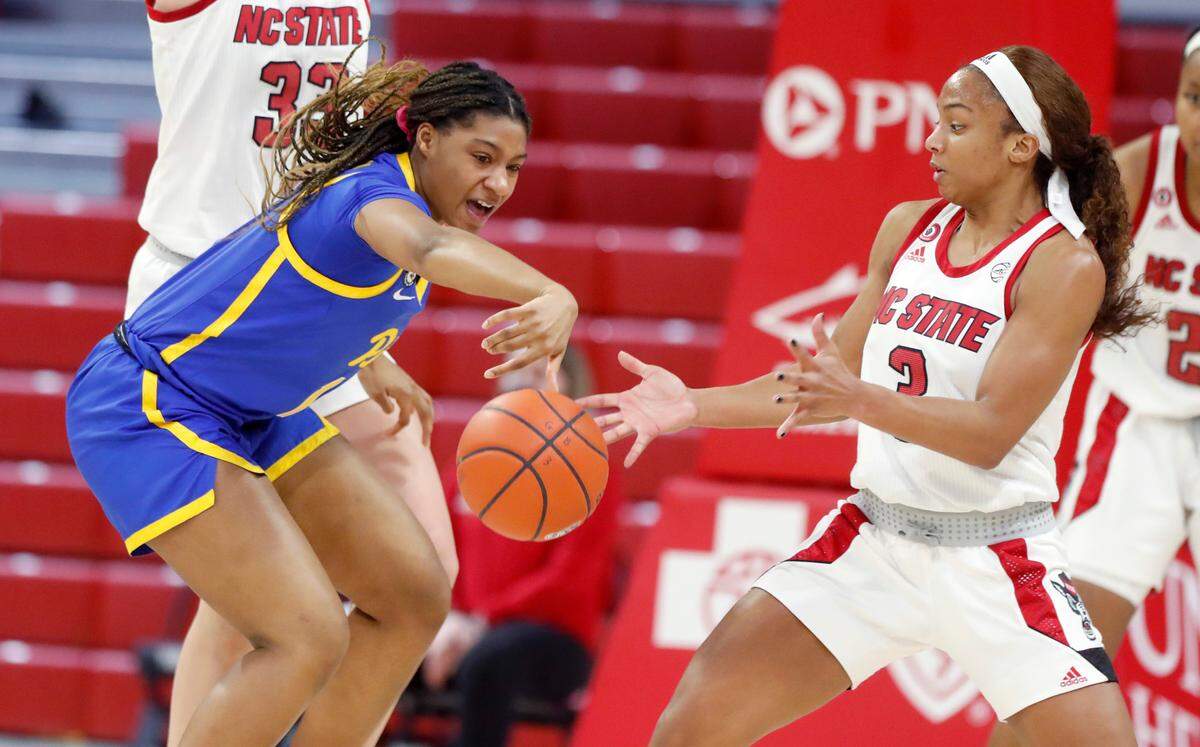 N.C. State’s Kai Crutchfield (3) steals the ball from Pittsburgh’s Tracey Hueston (13) during the second half of N.C. State’s 83-53 victory over Pittsburgh at Reynolds Coliseum in Raleigh, N.C., Thursday, February 25, 2021.