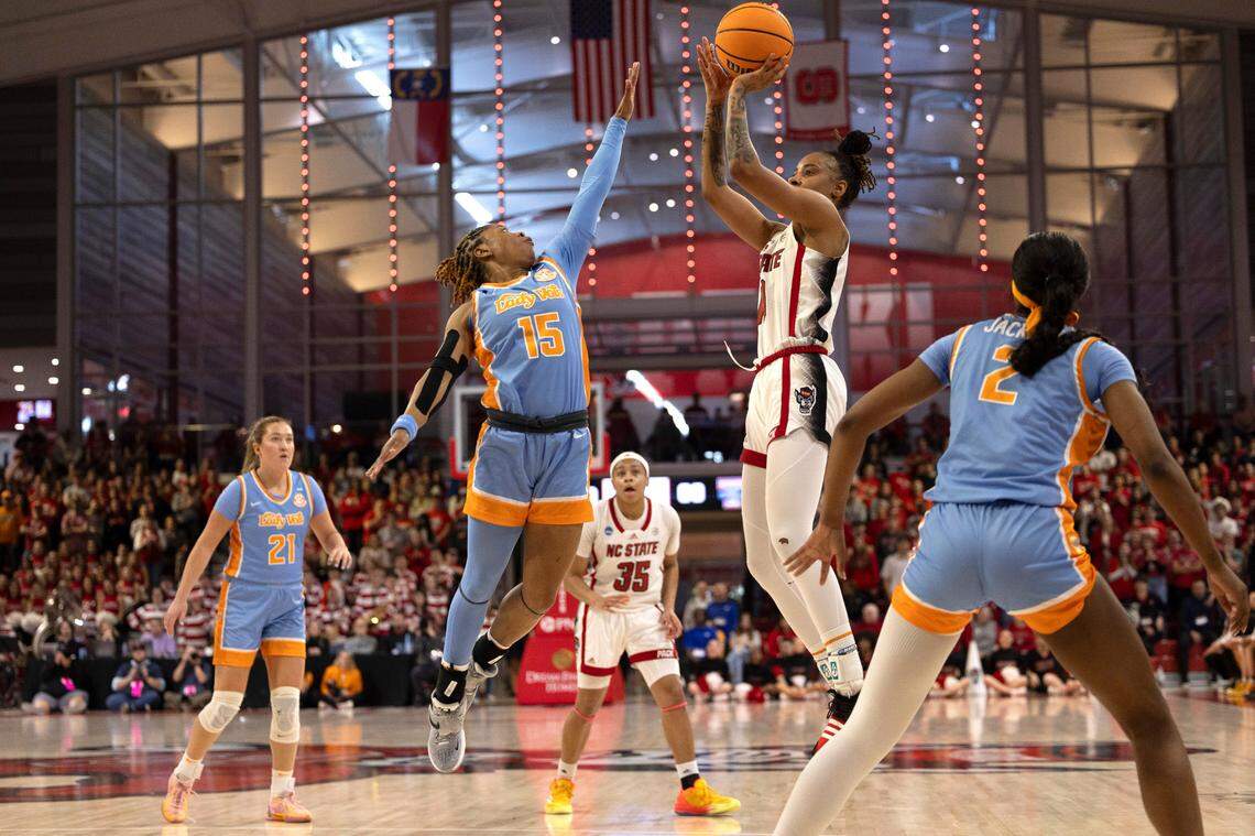 NC State’s Saniya Rivers (22) shoots as Tennessee’s Jasmine Powell (15) defends during the first half of the second round of the Division I Women’s Basketball Championship at Reynolds Coliseum in Raleigh, North Carolina, on March 25, 2024.