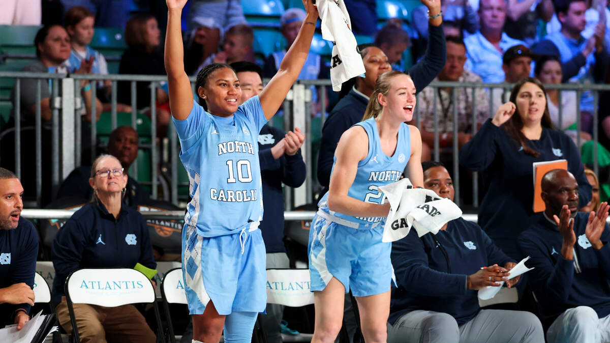North Carolina Tar Heels guards Reniya Kelly (10) and Lexi Donarski (20) celebrate during the second half against the Indiana Hoosiers on Nov. 25 at the Atlantis Resort in Paradise Island, Bahamas. Kelly and Dinarski led the Tar Heels in scoring Thursday night, Feb. 13, in a home win over Virginia Tech.