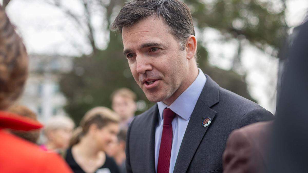 North Carolina Attorney General Jeff Jackson speaks to the crowd following a press briefing on President Trump’s executive orders on Friday, January 31, 2025 at the State Capitol in Raleigh, N.C.