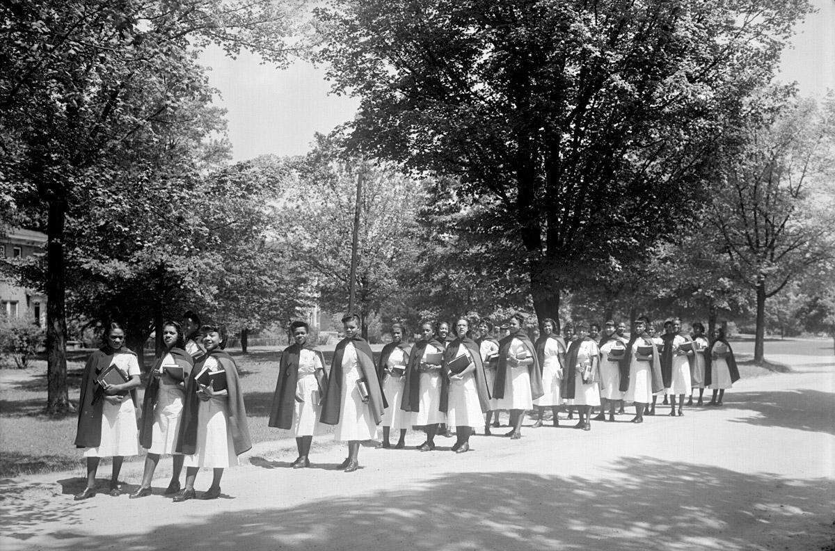 Students from the St. Agnes Hospital Nursing School at St. Augustine’s College on campus in 1949.