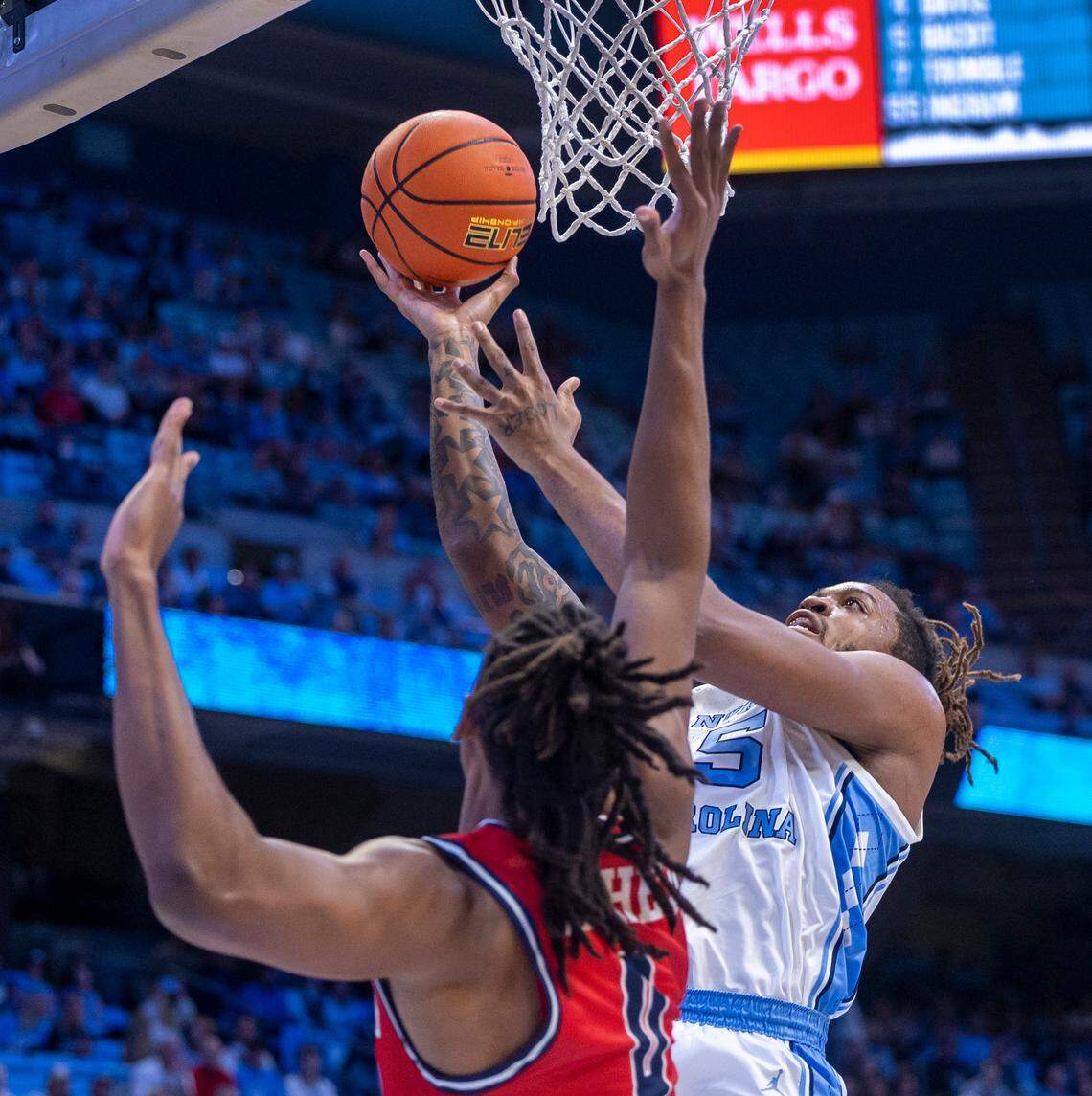 North Carolina’s Armando Bacot (5) puts up a shot against Radford’s Justin Archer (0) in the first half on Monday, November 6, 2023 at the Dean Smith Center in Chapel Hill, N.C.