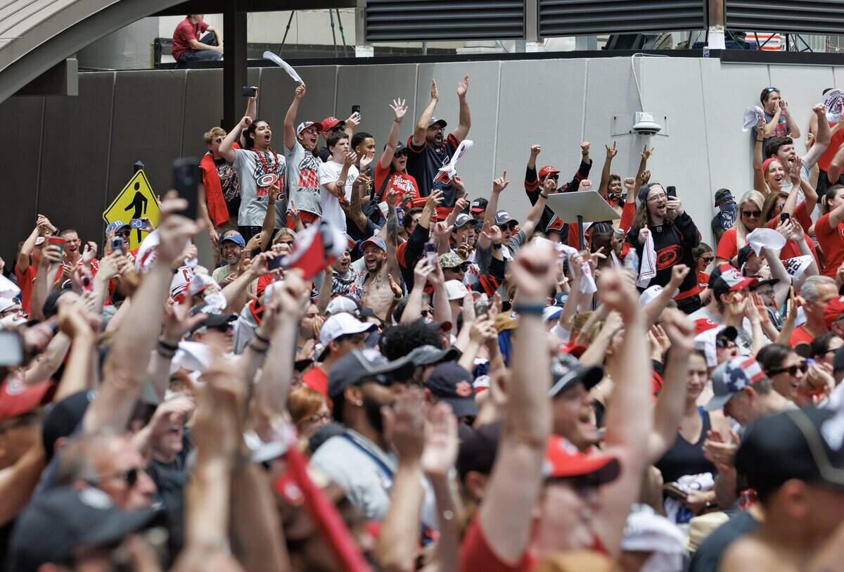 Carolina Hurricanes fans cheer during a rally honoring the team’s 2026 Stanley Cup victory on Saturday, June 20, 2026, in Raleigh, N.C.