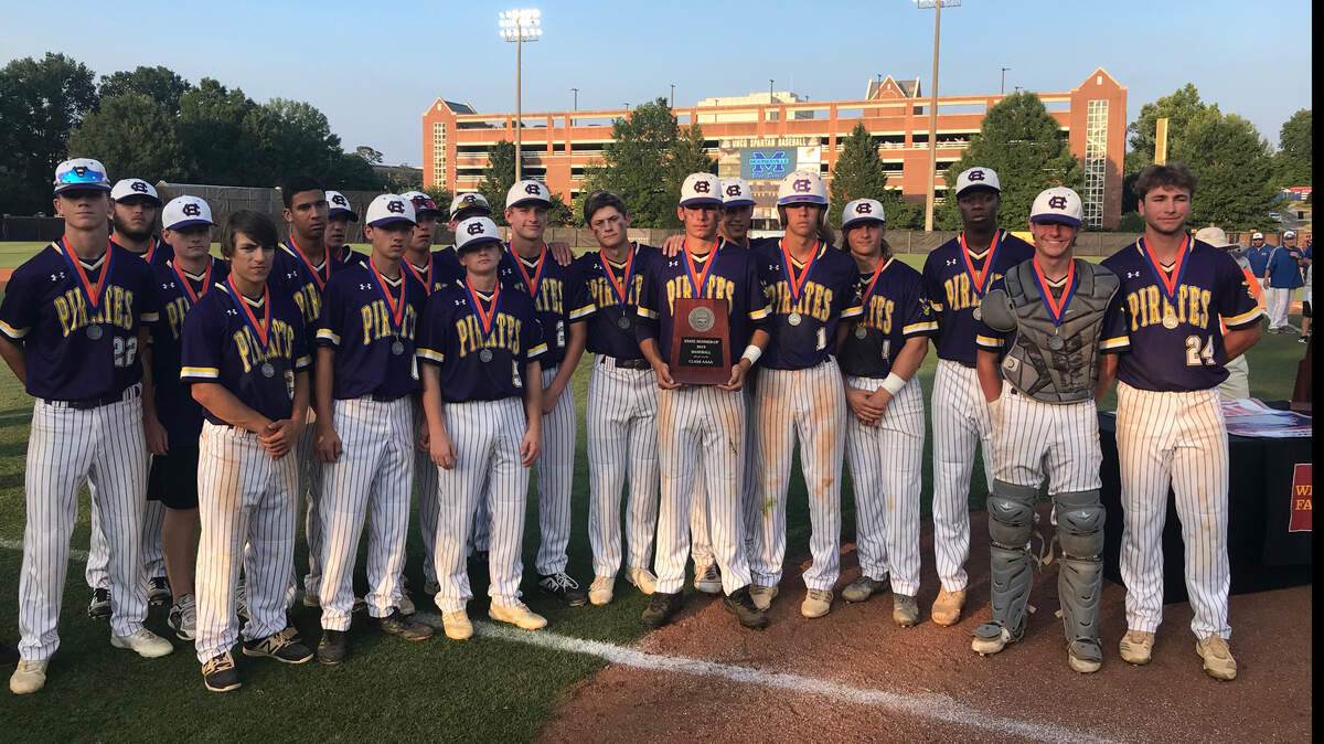 The Corinth Holders Pirates a carpet their 4A runner-up plaque after falling to Mooresville 8-2 in Game 2 of the 4A finals. The Blue Devils swept the Pirates 2-0.