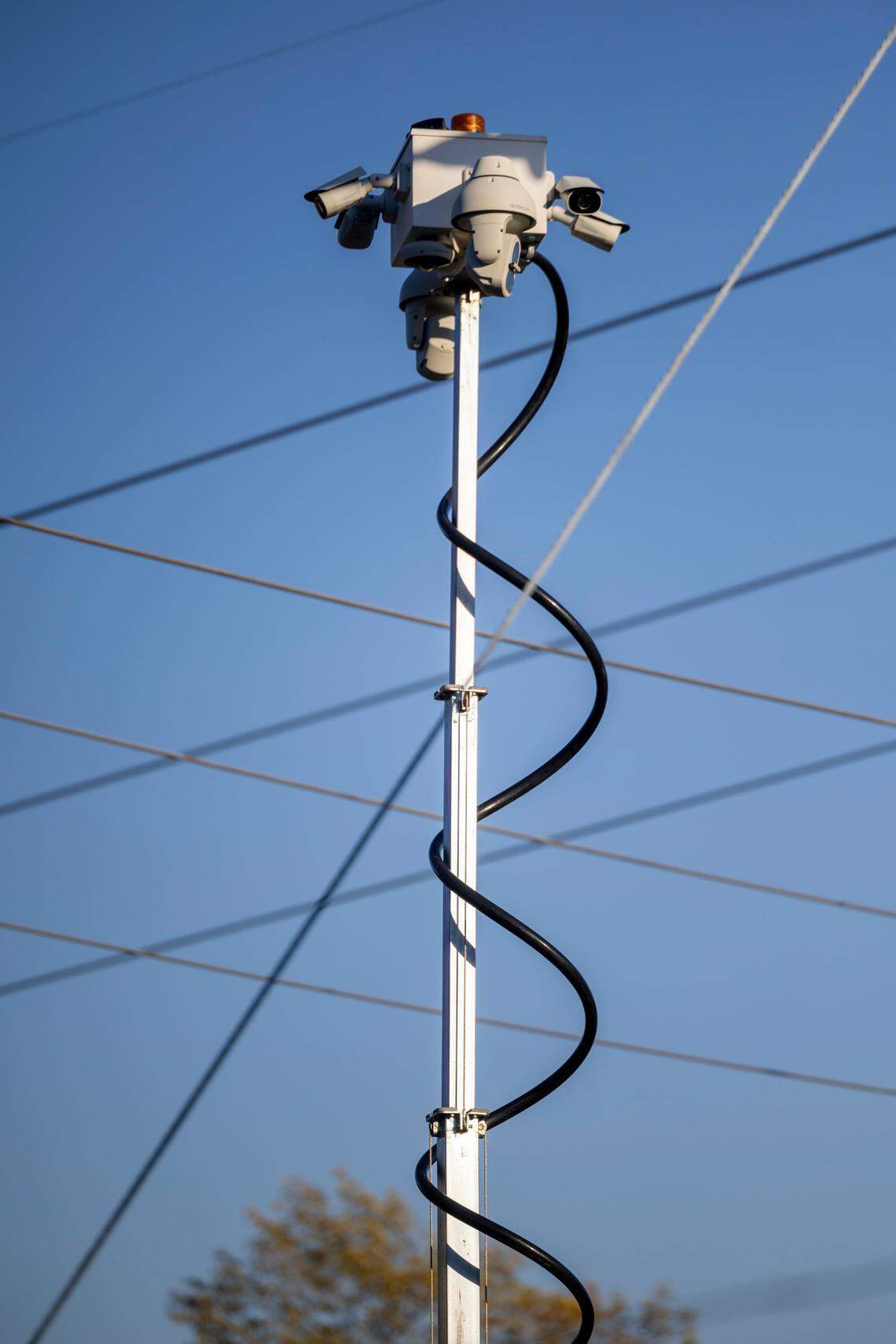 Security cameras monitor a Duke Energy substation in Carthage, one of two stations in Moore County that were attacked in December 2022 leaving 45,000 customers without power and exposing a major vulnerability in the nation’s power grid.