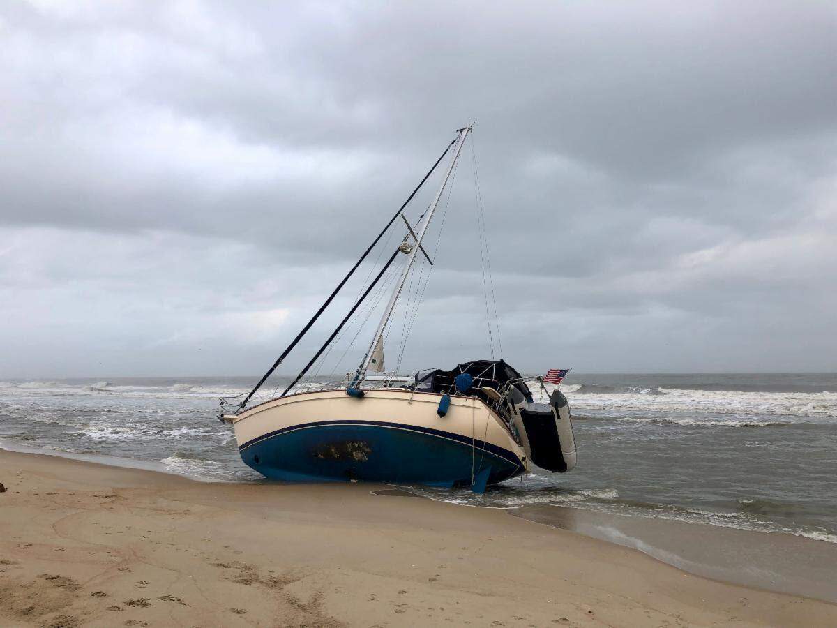 The National Park Service said it’s working with the U.S. Coast Guard and the boat’s owner to remove any hazardous substances and to remove the boat from the beach.