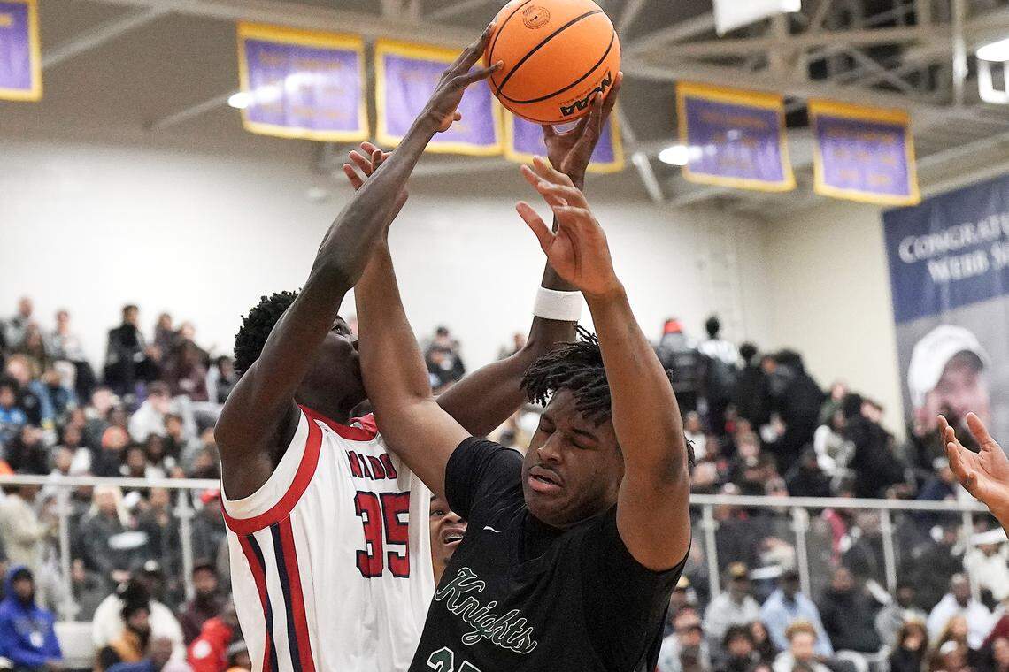 Coronado's Siyahe Siaisiai (35) secures the rebound over Greenfield's Braxten Dubose (35) during the first half. The Greenfield Knights and the Coronado Cougars (Nevada) met in the finals of the Day'Ron Sharpe bracket of the  John Wall Holiday Tournament in Raleigh, N.C. on December 30, 2025.
