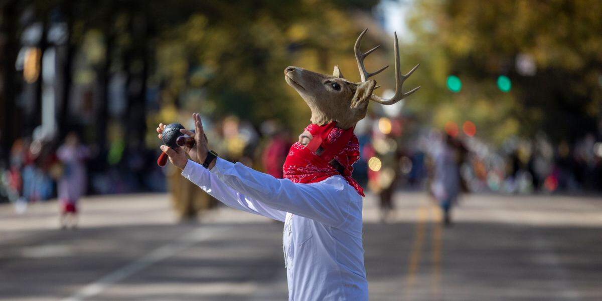 Performers with Delegacion Cultural de Mexico perform on Hillsborough Street during the 80th annual Raleigh Christmas Parade on Saturday, November 23, 2024 in Raleigh, N.C.