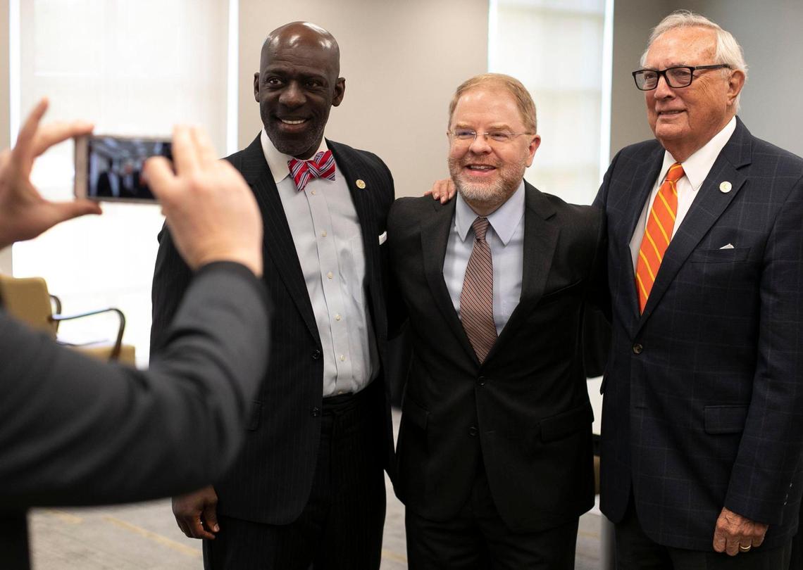 Then President-elect Peter Hans poses for a photograph with Board of Governors members Reginald Holley, left, and Leo Daughtry following their meeting on June 19, 2020 in Chapel Hill. If a new bill passes, lobbyists like Holley would be able to finish serving their terms. But lobbyists could not be appointed moving forward, and future board members would have to resign if they or their spouses become lobbyists.