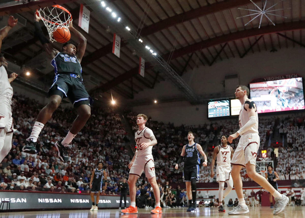 Duke’s Mark Mitchell (25) slams in two during Duke’s 77-67 victory over Virginia Tech at Cassell Coliseum in Blacksburg, Va., Monday, Jan. 29, 2024.