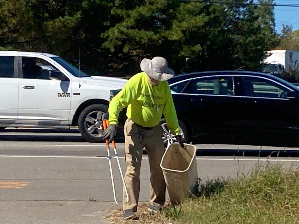 Working on busy New Bern Avenue, Gus Vandermeeren has never been hit by a car. But he’s come close after stepping on an untied shoelace and falling on the pavement. “Now, I always check my shoelaces.”
