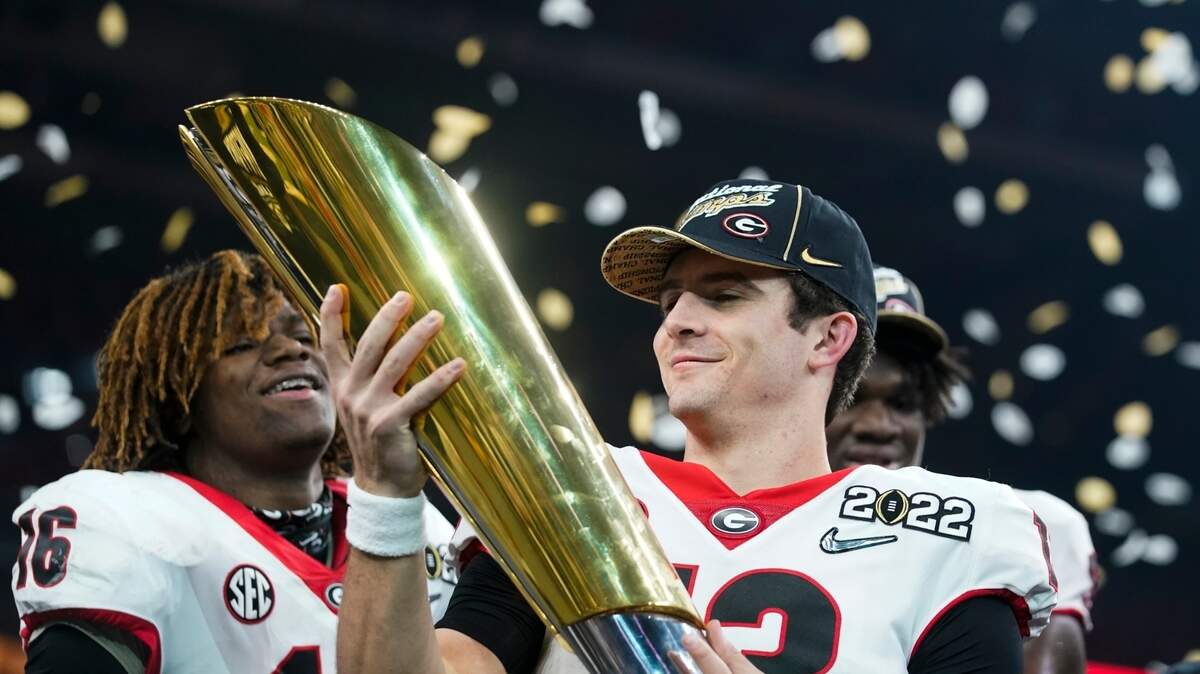 Georgia quarterback Stetson Bennett celebrates after the College Football Playoff championship football game against Alabama Tuesday, Jan. 11, 2022, in Indianapolis. Georgia won 33-18. The SEC has won five of the eight CFP championships and the ACC was left out of the semifinals for the first time this season.