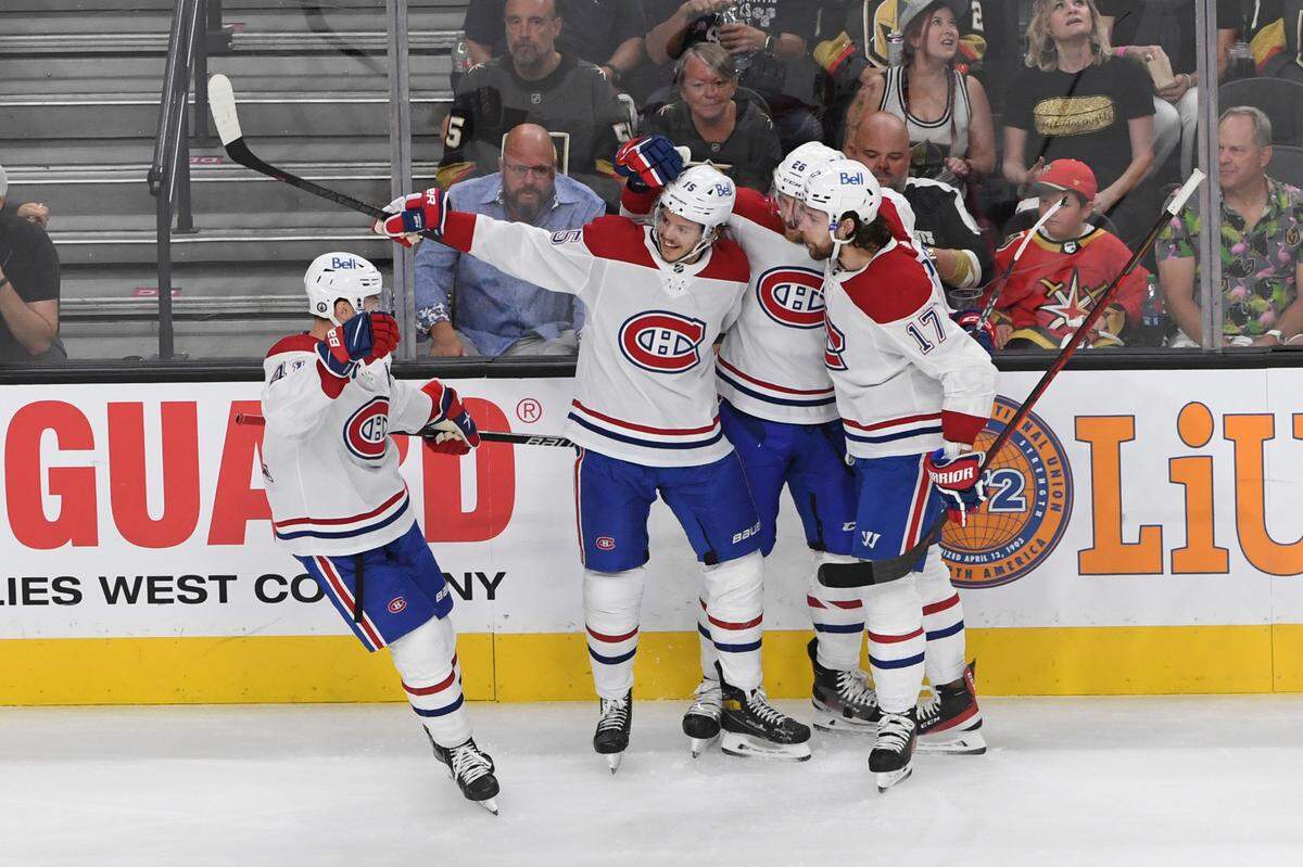 The Montreal Canadiens celebrate a goal by Montreal Canadiens center Jesperi Kotkaniemi, second left, during the first period in Game 5 of an NHL hockey Stanley Cup semifinal playoff series against the Vegas Golden Knights Tuesday, June 22, 2021, in Las Vegas. (AP Photo/David Becker)