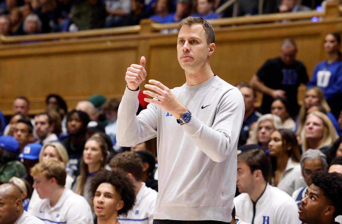 Duke head coach Jon Scheyer directs his team during the second half of Duke’s 106-69 victory over Queens University at Cameron Indoor Stadium in Durham, N.C., Saturday, Dec. 30, 2023.