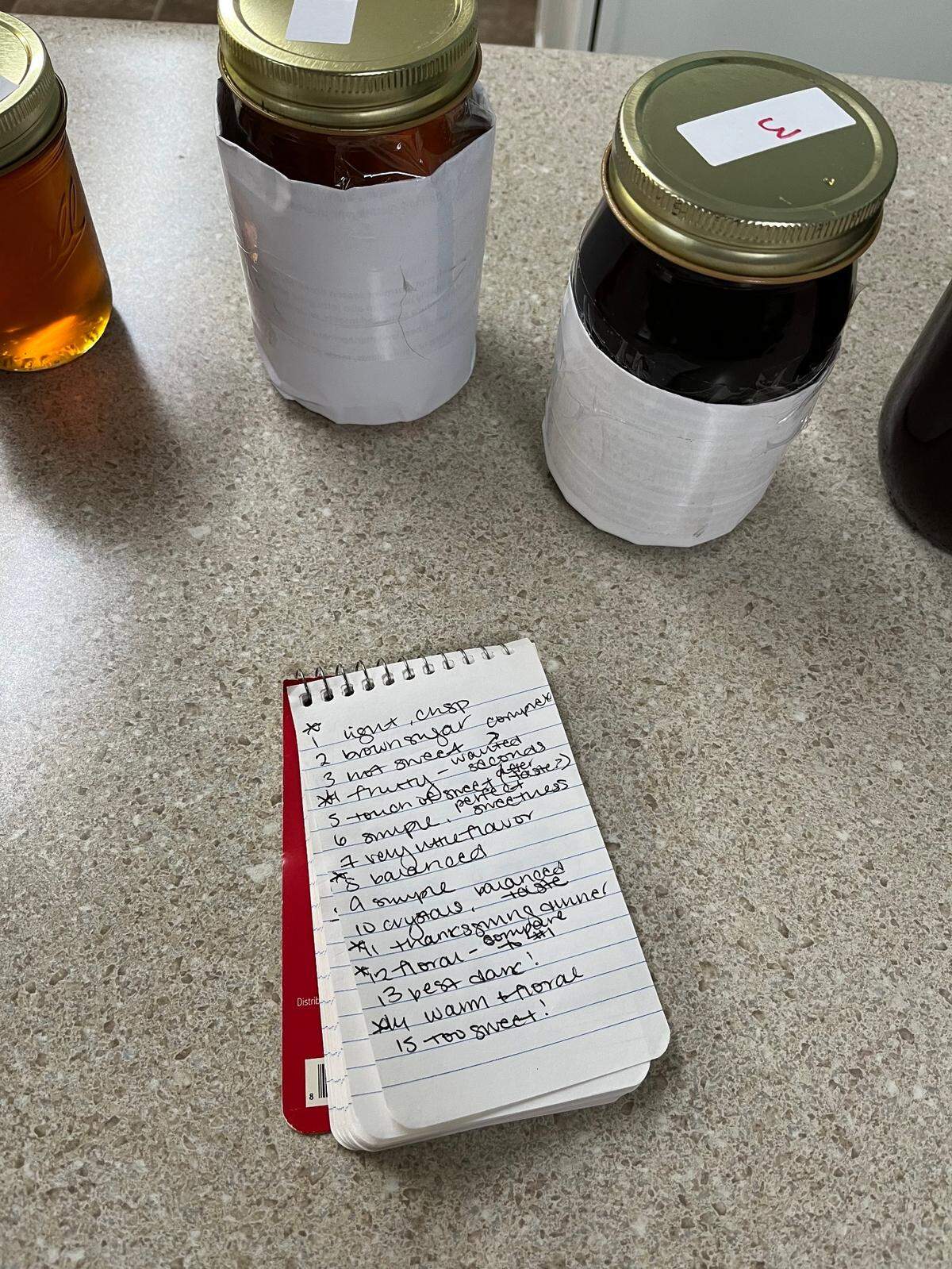 News & Observer reporter Kimberly Cataudella’s notebook from the the Richmond County Beekeepers Association’s Honey Tasting Contest in Ellerbe, N.C., on Oct. 25, 2022. The jar on the far right is current purple honey, covered up to hide the violet color.