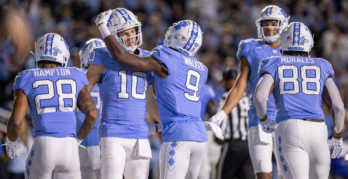 North Carolina wide receiver Devontez Walker (9) reacts after scoring on a 25-yard pass completion from quarterback Drake Maye in the first quarter against Virginia on Saturday, October 21, 2023 at Kenan Stadium in Chapel Hill, N.C.