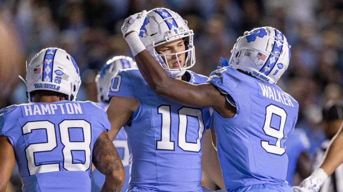 North Carolina wide receiver Devontez Walker (9) reacts after scoring on a 25-yard pass completion from quarterback Drake Maye in the first quarter against Virginia on Saturday, October 21, 2023 at Kenan Stadium in Chapel Hill, N.C.