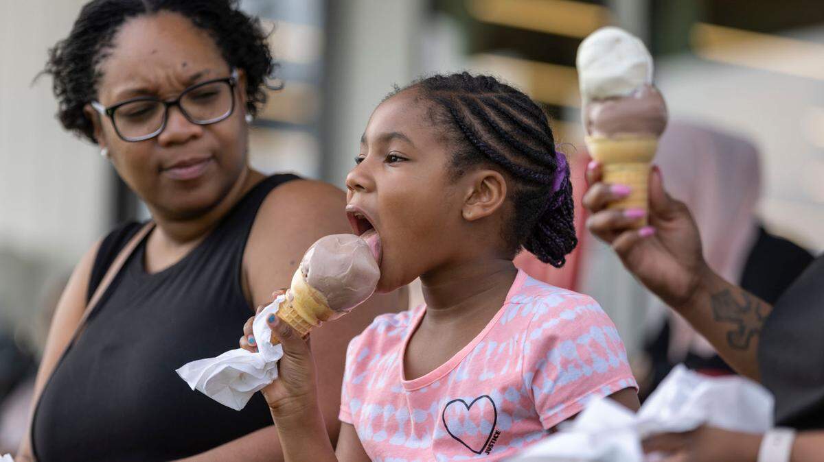 Seven-year-old Madison Bryant of Raleigh enjoys a cone of ice cream. File photo.