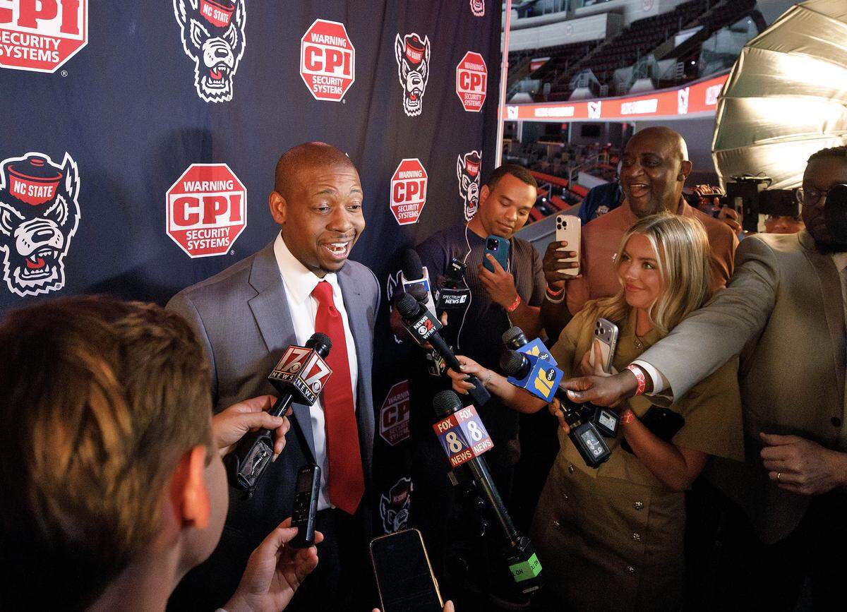New N.C. State men’s basketball head coach Justin Gainey speaks with reporters following a press conference at Lenovo Center on Wednesday, April 1, 2026, in Raleigh, N.C.