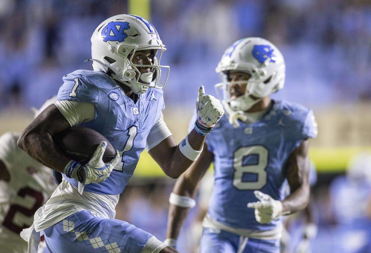 North Carolina receiver Jordan Shipp (1) heads to the end zone for a touchdown on a 55 yards pass play from quarterback Gio Lopez (7) to give the Tar Heels a 20-3 lead over Stanford in the fourth quarter on Saturday, November 8, 2025 at Kenan Stadium in Chapel Hill, N.C.