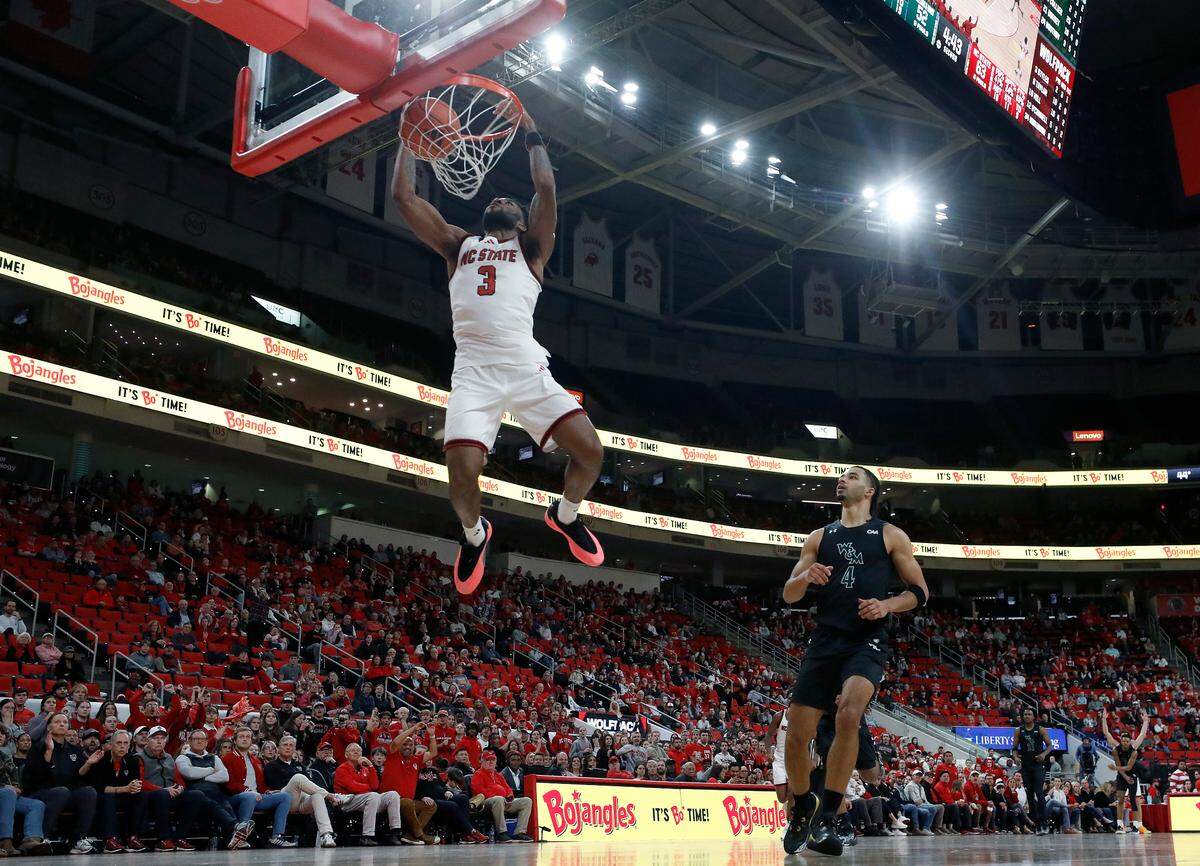 N.C. State’s Dontrez Styles slams in two during the second half of the Wolfpack’s 84-61 win over William & Mary at Lenovo Center on Friday, Nov. 22, 2024, in Raleigh, N.C.
