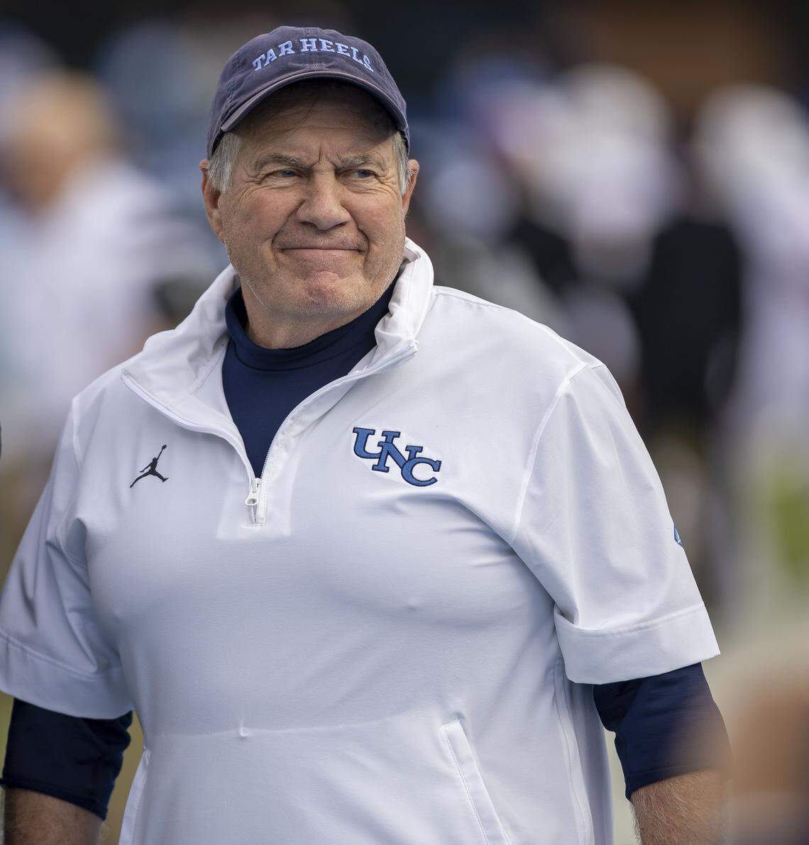 North Carolina coach Bill Belichick watches his players warm up prior to the Tar Heels’ game against Stanford on Saturday, November 8, 2025 at Kenan Stadium in Chapel Hill, N.C.