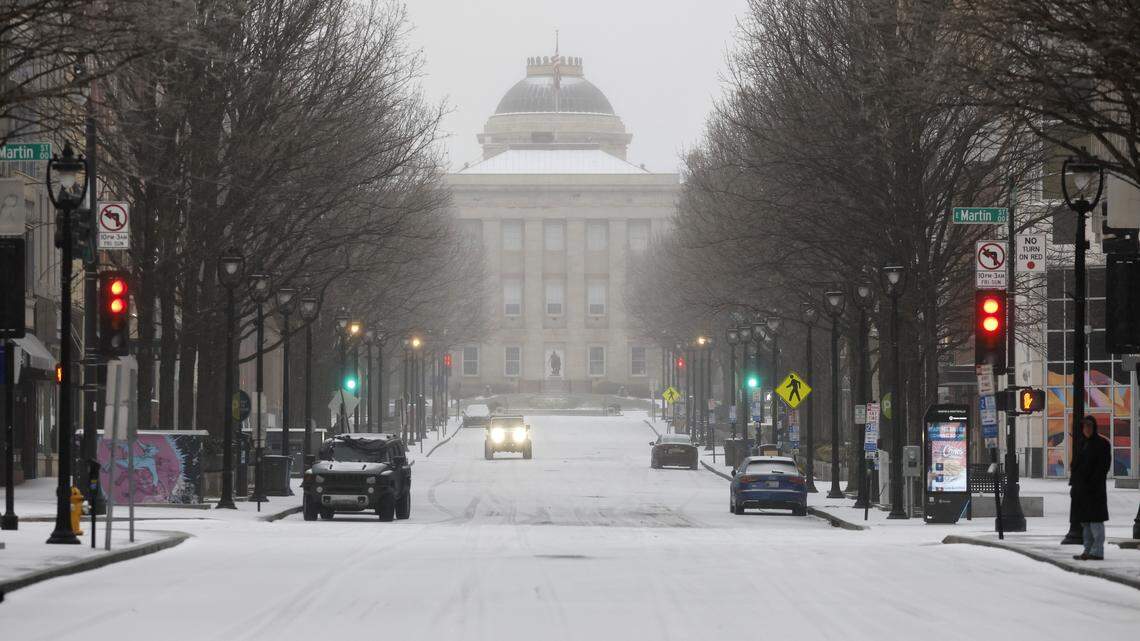 ‘Stay put.’ Triangle roads covered with snow and ice. Driving discouraged