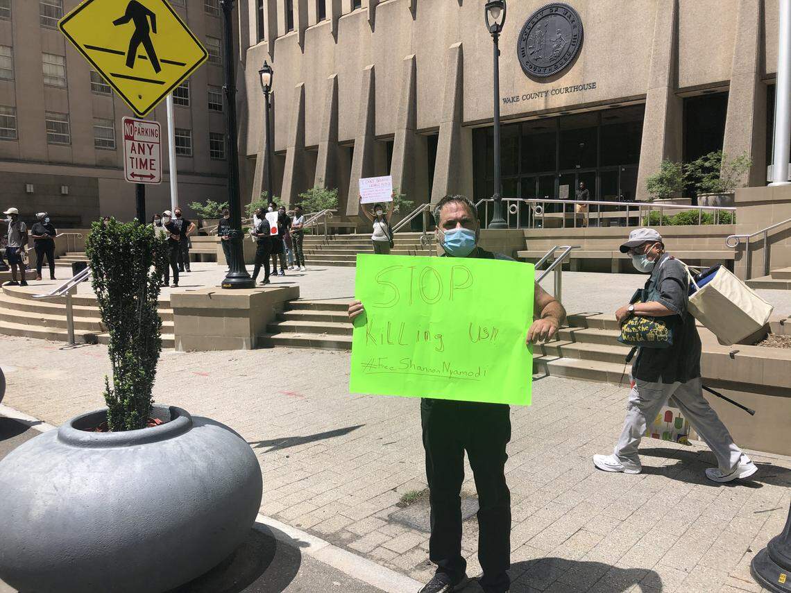 Protesters began to gather at the Wake County Courthouse in downtown Raleigh Saturday in support of George Floyd, killed by police in Minneapolis. A larger protest is scheduled for 5 p.m.