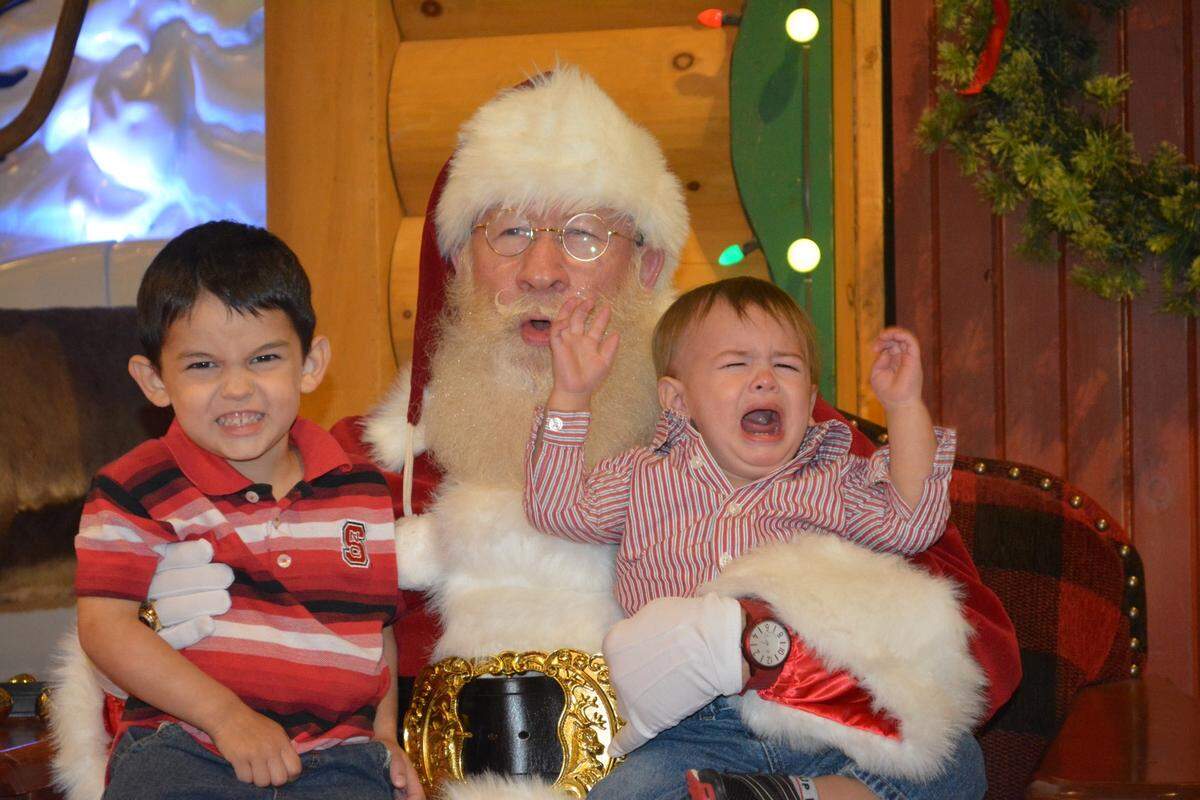 Barbara Couchon’s grandchildren with Santa.