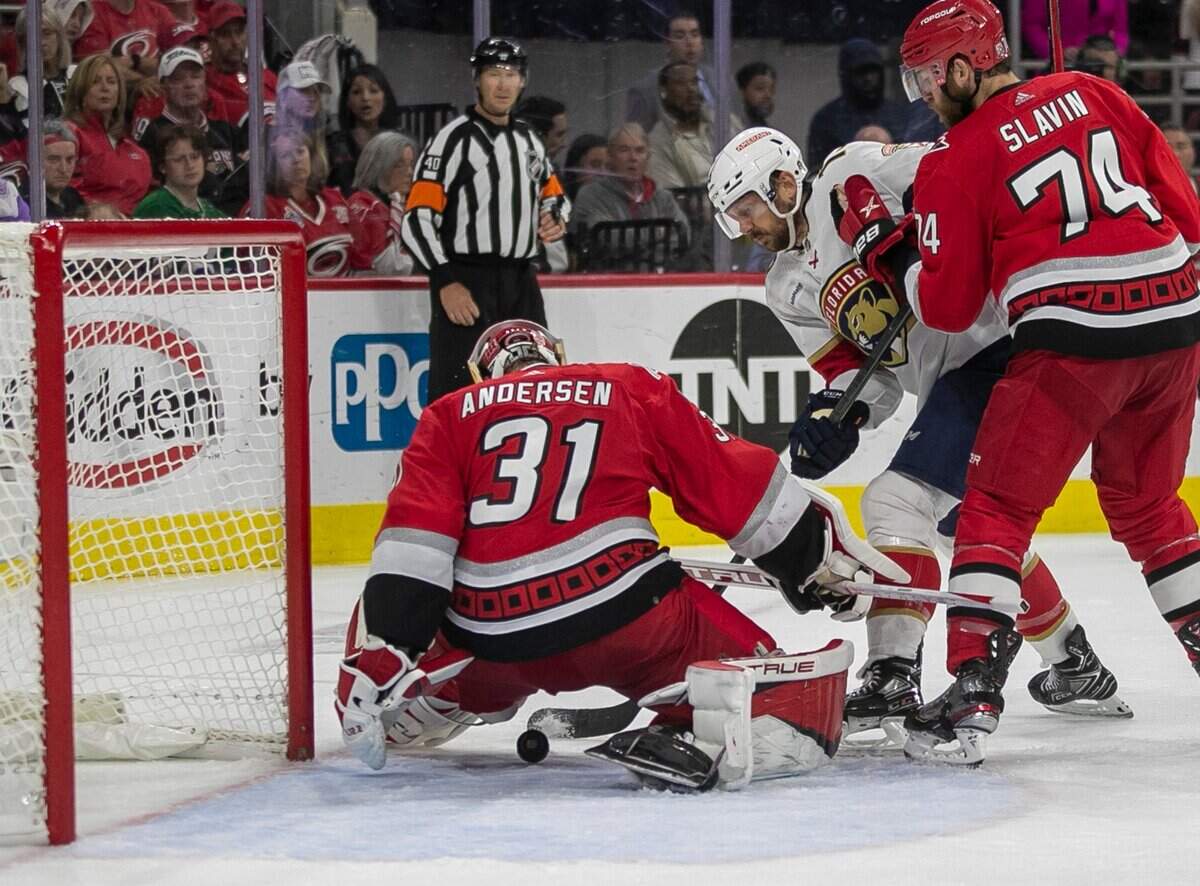 The Florida Panthers Sam Reinhart (13) gets his stick on the puck, but can’t score on Carolina Hurricanes goalie Frederik Andersen (31) in the third overtime period during Game 1 of the Eastern Conference Finals on Friday, May 19, 2023 at PNC Arena in Raleigh, N.C.
