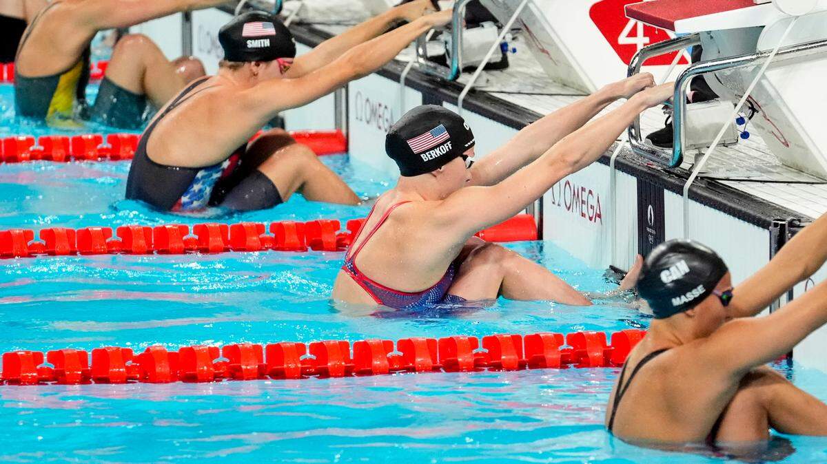 Jul 30, 2024; Nanterre, France; Regan Smith (USA) and Katharine Berkoff (USA) in the women’s 100-meter backstroke final during the Paris 2024 Olympic Summer Games at Paris La Défense Arena.