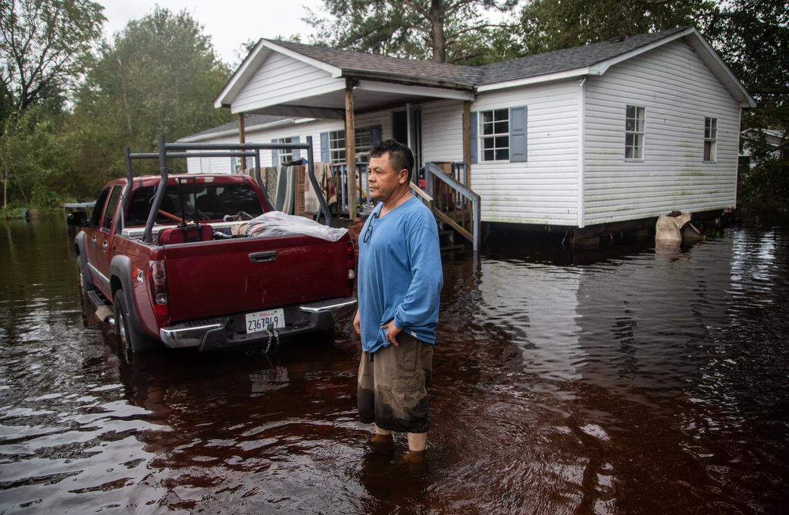 Luis  Gallegos, 50, stands in the yard of his flooded home on Will Baker Road in Kinston Sunday, Sept. 16, 2018 following the aftermath of Hurricane Florence. Flood levels are expected to rise in parts of Kinston.