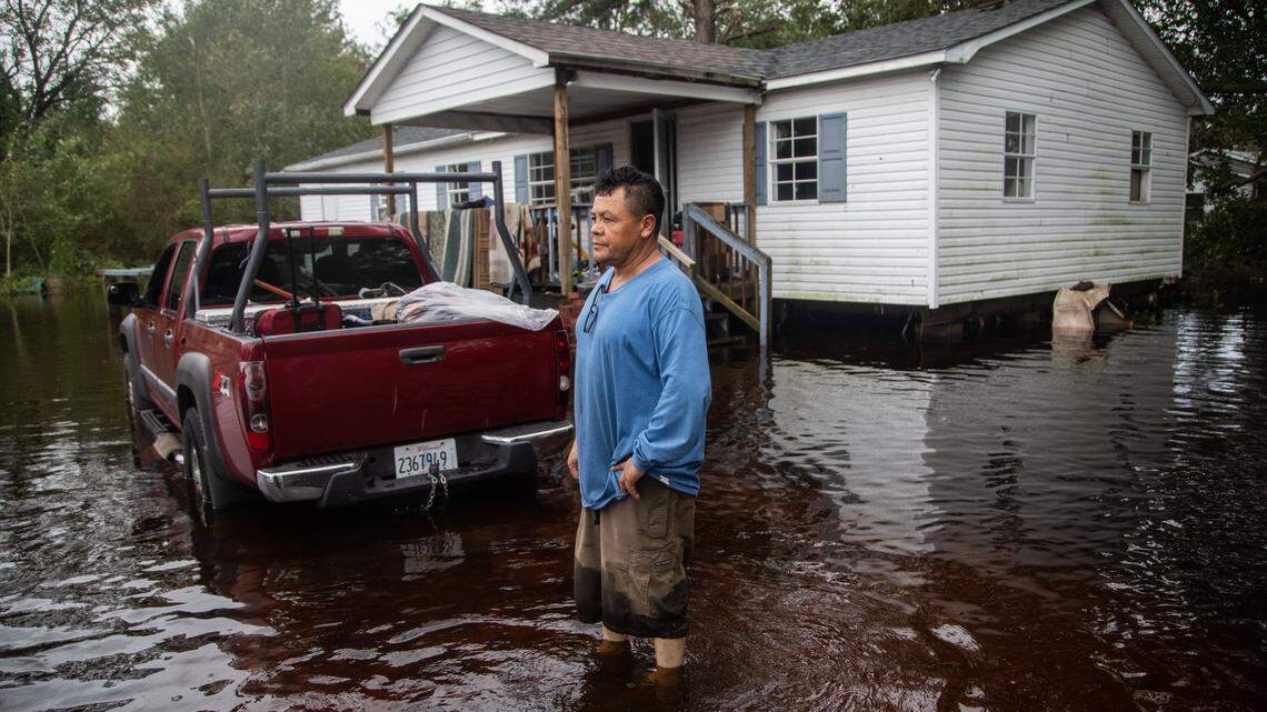 Luis  Gallegos, 50, stands in the yard of his flooded home on Will Baker Road in Kinston Sunday, Sept. 16, 2018 following the aftermath of Hurricane Florence. Flood levels are expected to rise in parts of Kinston.