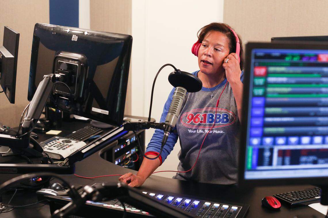 Madison Lane works in the studio at Curtis Media’s WBBB, 96.1 radio station on Monday, Feb. 18, 2019.