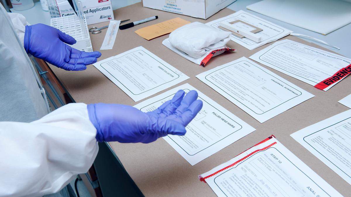 A criminalist at the Office of the Chief Medical Examiner in New York demonstrates how to analyze a rape kit in this file photo. The Durham County District Attorney’s Office announced two rape convictions Monday, Aug. 1, 2022, through the Durham Sexual Assault Kit Initiative.