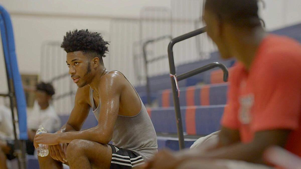 Kinston High School basketball player Dontrez Styles, far left, in the documentary “Something in the Water: A Kinston Basketball Story.”