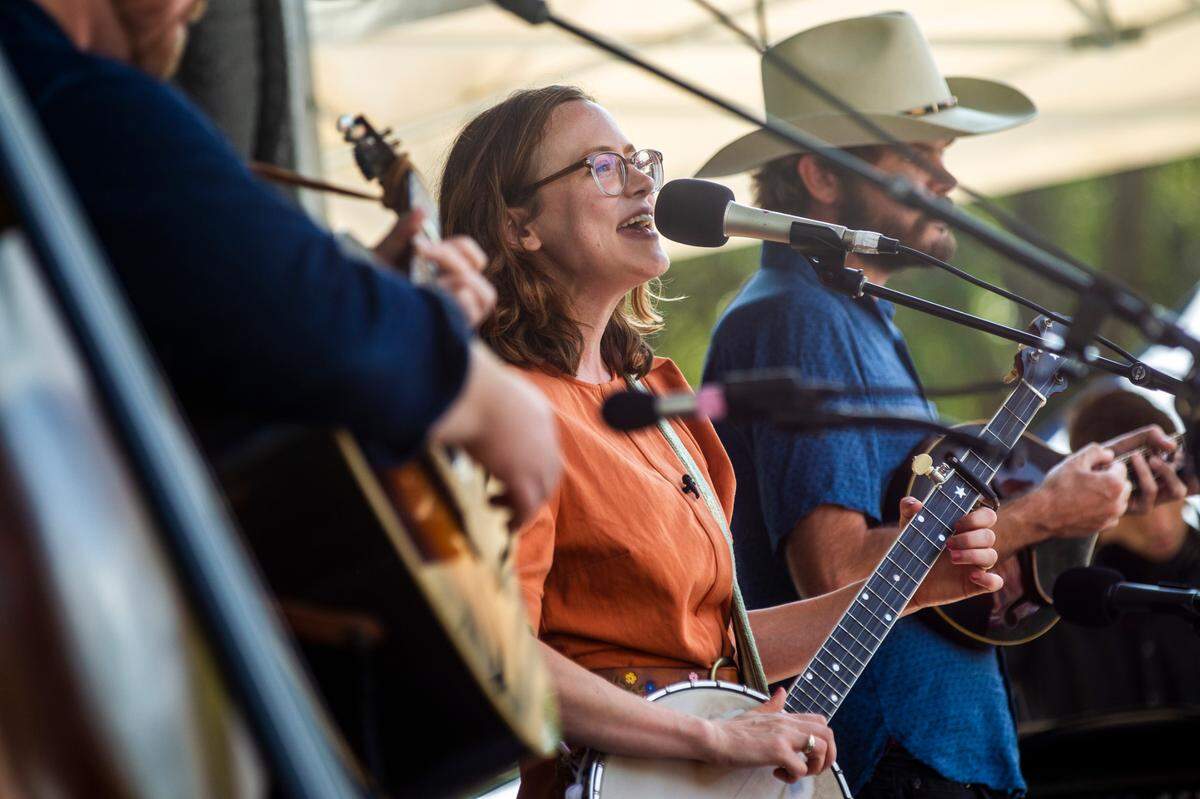 The Chatham Rabbits perform outside the Duke Energy Center for the Performing Arts during the IBMA World of Bluegrass festival in downtown Raleigh Friday, Oct. 1, 2021.
