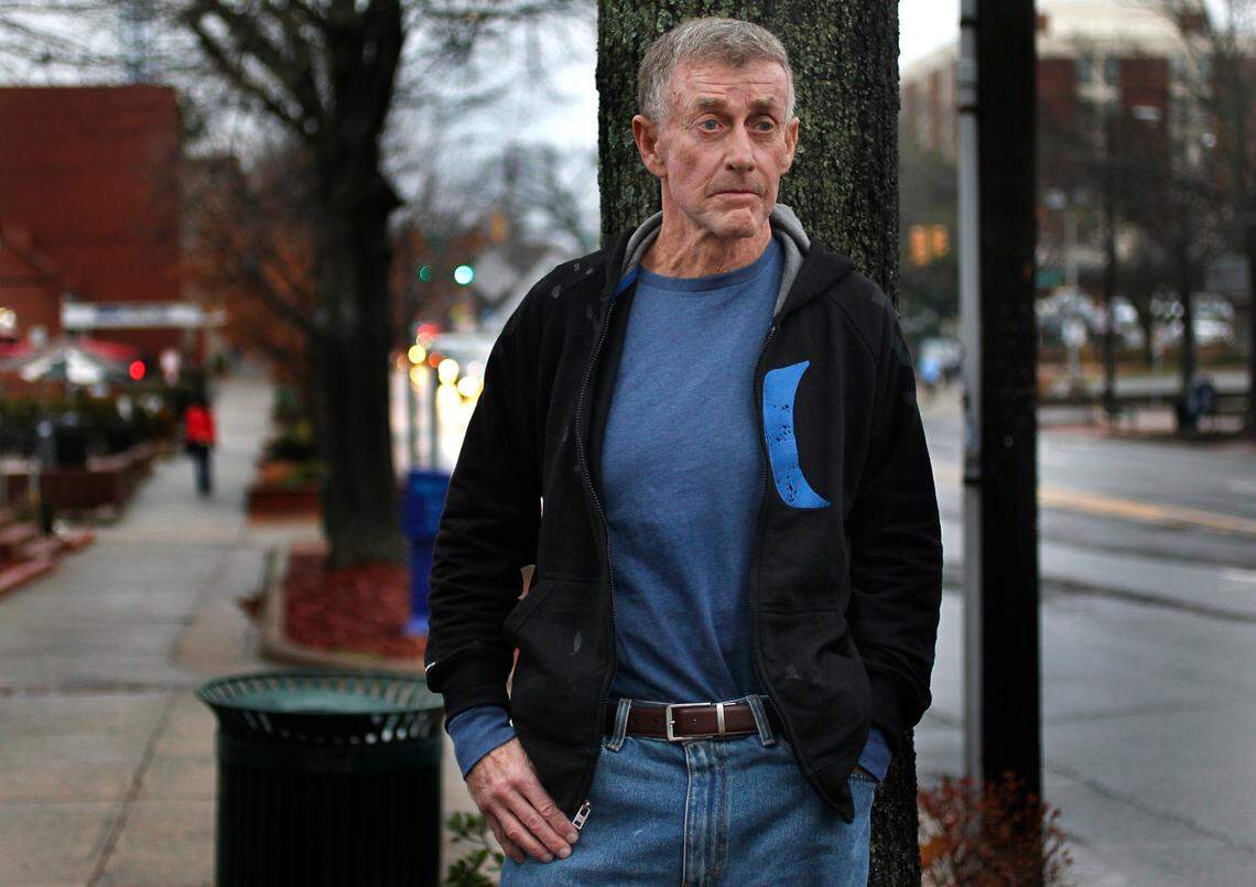 Michael Peterson stands outside his lawyer’s office on Franklin Street in Chapel Hill Wednesday Dec. 21, 2011 shortly after he was released from house arrest. Peterson, 68 was released from prison after eight years last week when testimony by former SBI agent Duane Deaver was found to be perjured testimony by Judge Orlando Hudson.