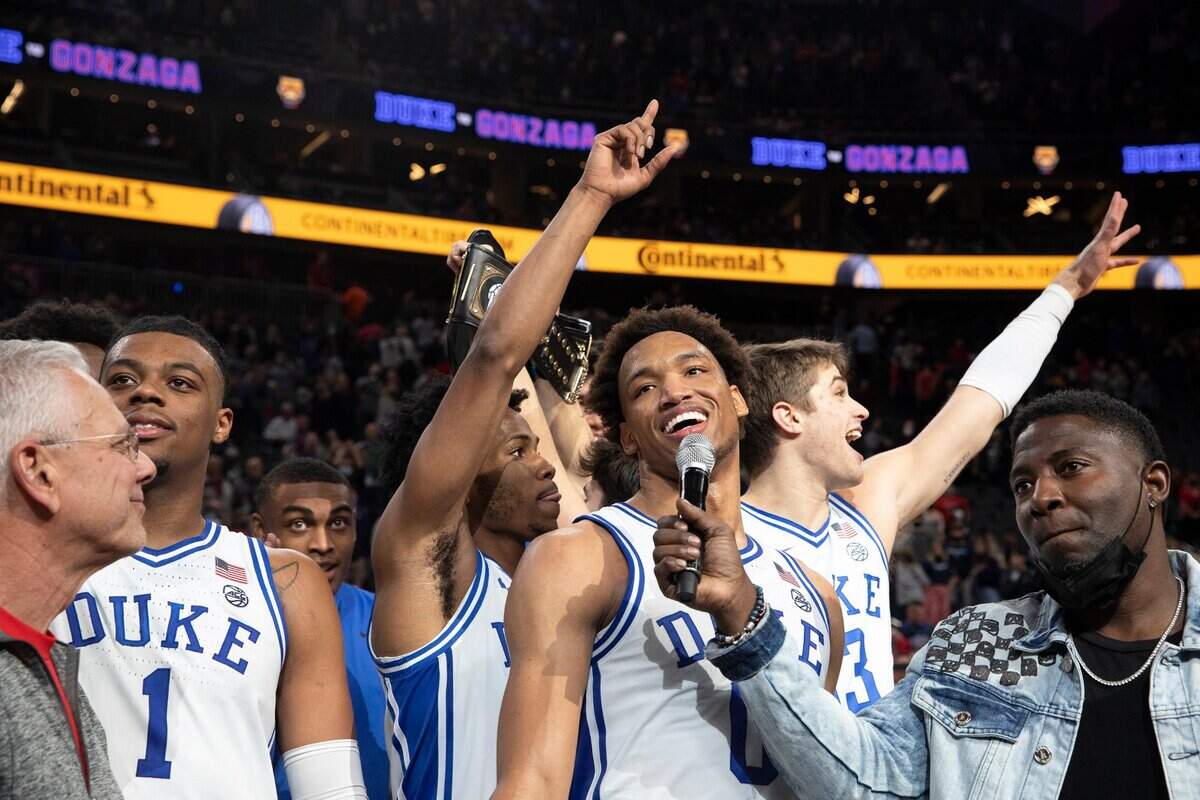 Duke forward Wendell Moore Jr. (0) receives the MVP award after winning an NCAA college basketball game against Gonzaga at the Good Sam Empire Classic Friday, Nov. 26, 2021, in Las Vegas. (AP Photo/Ellen Schmidt)