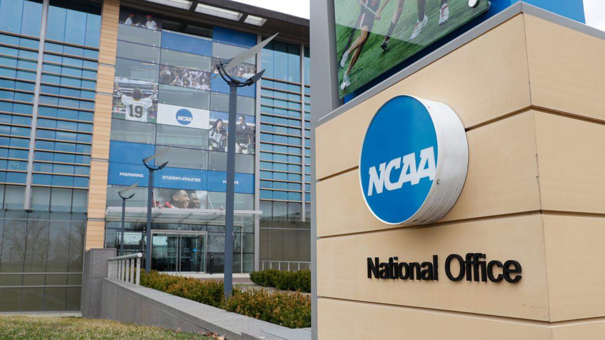 The NCAA headquarters in Indianapolis is shown in this Thursday, March 12, 2020, file photo. The Associated Press has learned that the NCAA has not tested players for performance-enhancing drugs while they’ve been at March Madness and other recent college championships. Three people familiar with testing protocols tell AP full-scale testing has not resumed since the coronavirus pandemic shut down college sports a year ago.