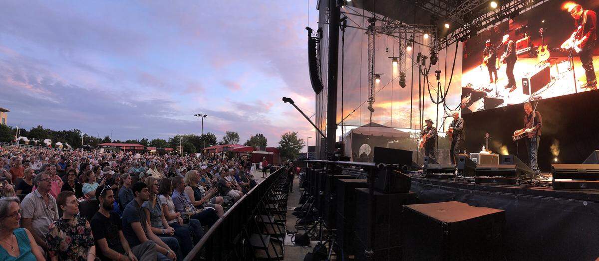 Trey Hensley, left, and Rob Ickes, right, perform with Tommy Emmanuel at the Red Hat Amphitheater during Raleigh’s World of Bluegrass in 2018. In 2021, COVID-19 vaccinations will be required for ticketed shows at Red Hat Amphitheater, as well as events in the Raleigh Convention Center and Duke Energy Center for the Performing Arts. The does not include the free events held outside. 