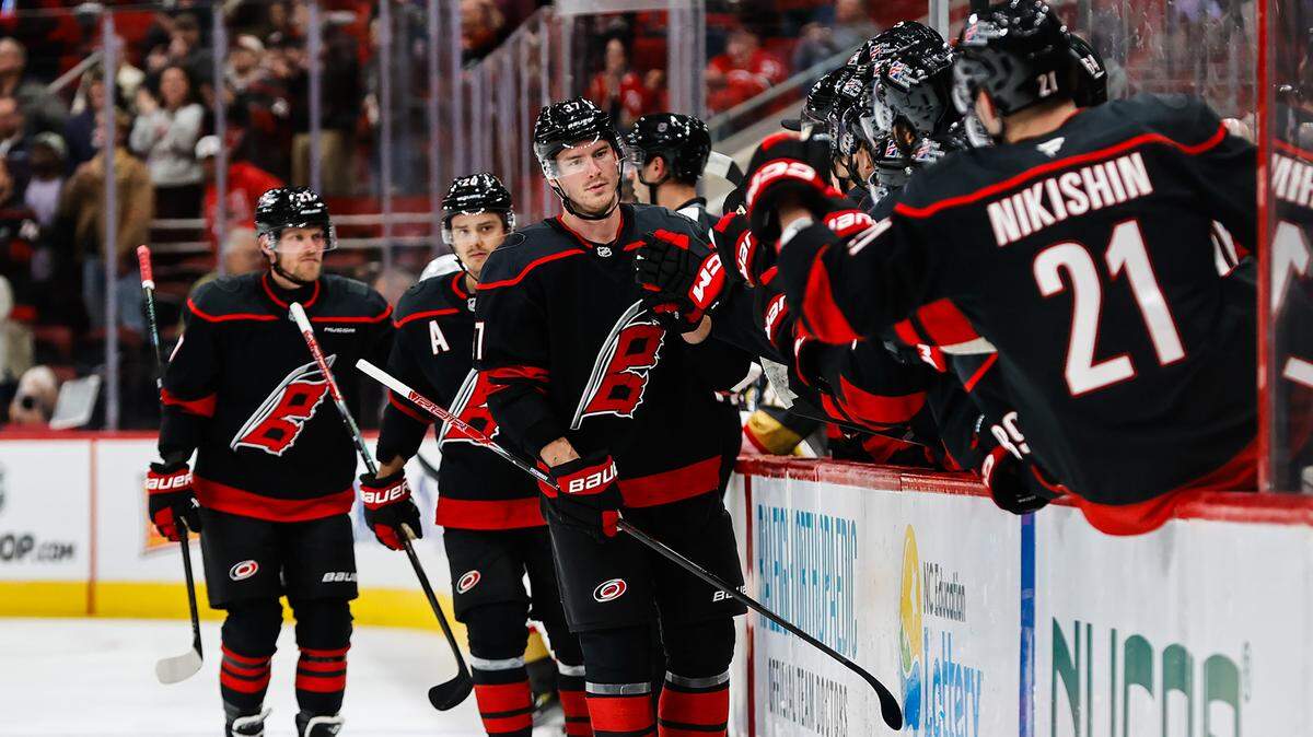 Andrei Svechnikov (37) of the Carolina Hurricanes celebrates a goal with teammates on the bench during the first period of the game against the Vegas Golden Knights at the Lenovo Center on October 28, 2025 in Raleigh, North Carolina. Svechnikov made it two goals in two games Thursday in a win over the New York Islanders.