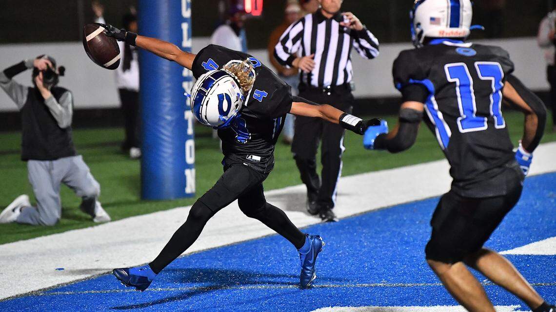 Clayton wide receiver TJ Campbell (4) celebrates after scoring the touchdown off the fourth down against Cleveland during the first half. Cleveland took on Clayton in a conference football game in Clayton, N.C. on October 31st in Clayton, N.C.