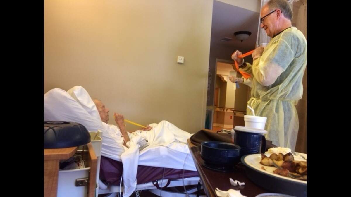 There was Dad, lying on what is supposedly his death bed — flexing exercise bands my oldest brother brought him, as my brother counted off like some surreal Jane Fonda.