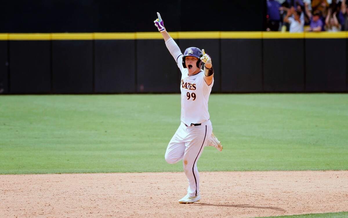 East Carolina’s Alec Makarewicz (99) celebrates hitting a homerun in the eighth inning during ECUís 13-7 victory over Texas in the Greenville Super Regional at Clark-LeClair Stadium Friday, June 10, 2022.
