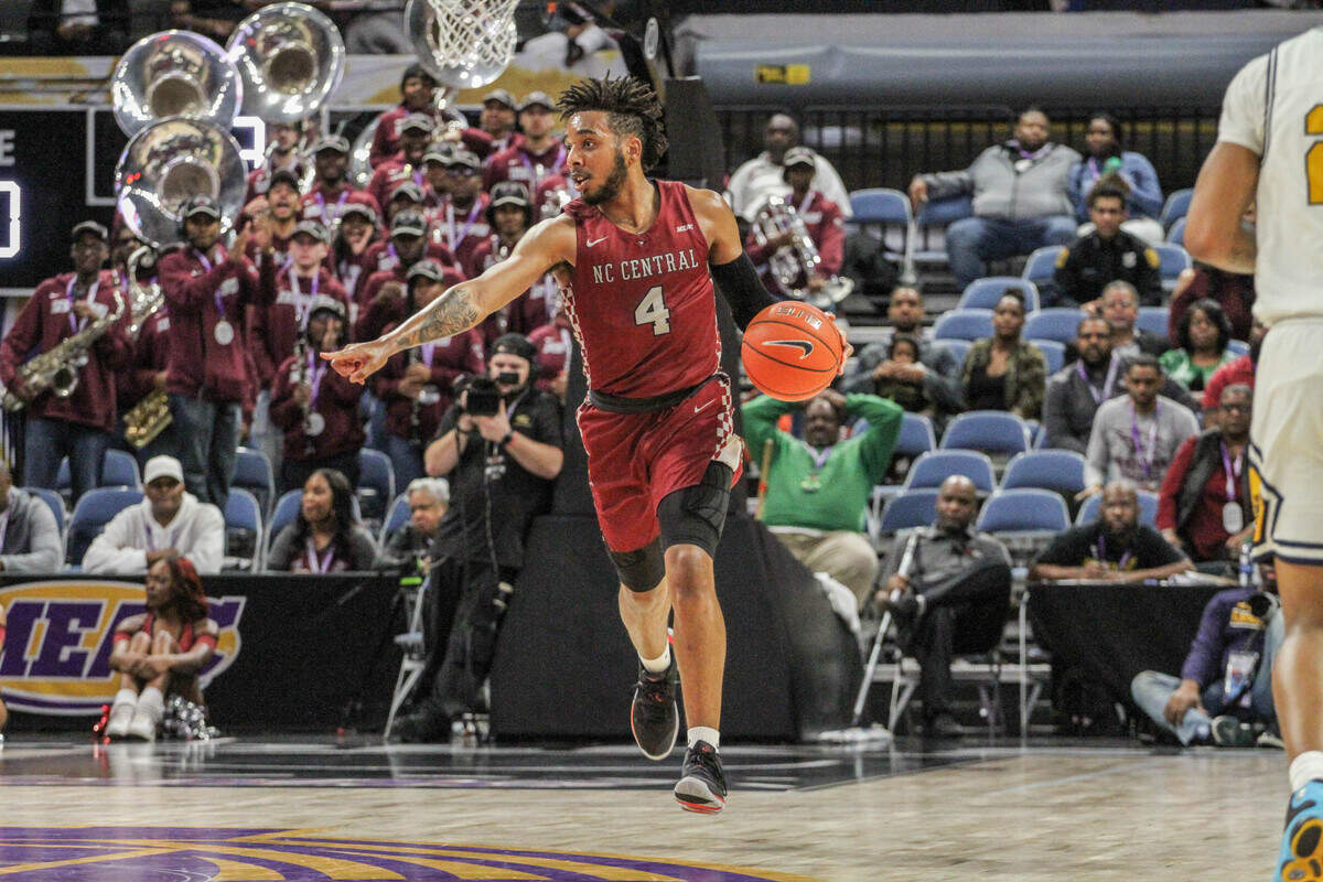 North Carolina Central guard Jordan Perkins brings the ball up the floor during the first half of the MEAC Tournament semifinals versus North Carolina A&T on Friday in Norfolk, Va.