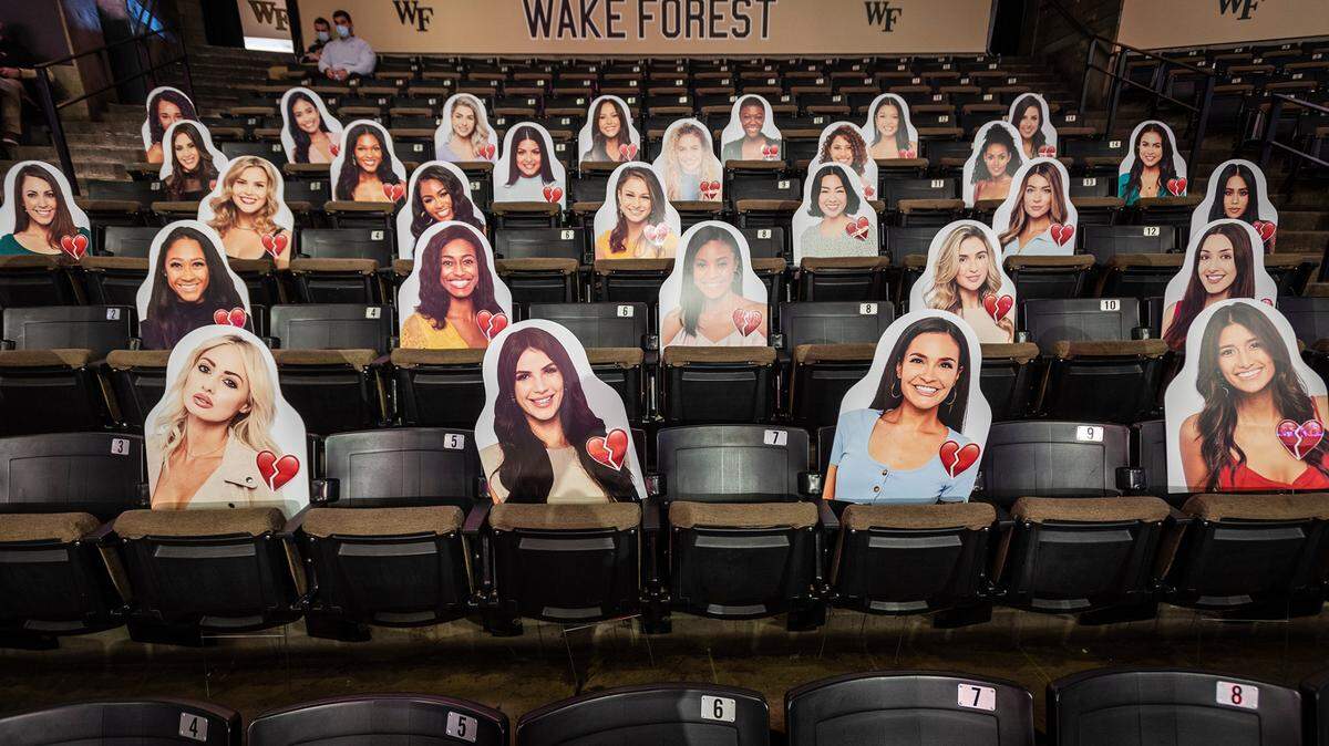 Cut outs of contestants on ABC’s “The Bachelor,” sit in LJVM Coliseum prior to the Wake Forest’s game against NC State on Saturday, Feb. 20, 2021 in Winston-Salem, N.C.