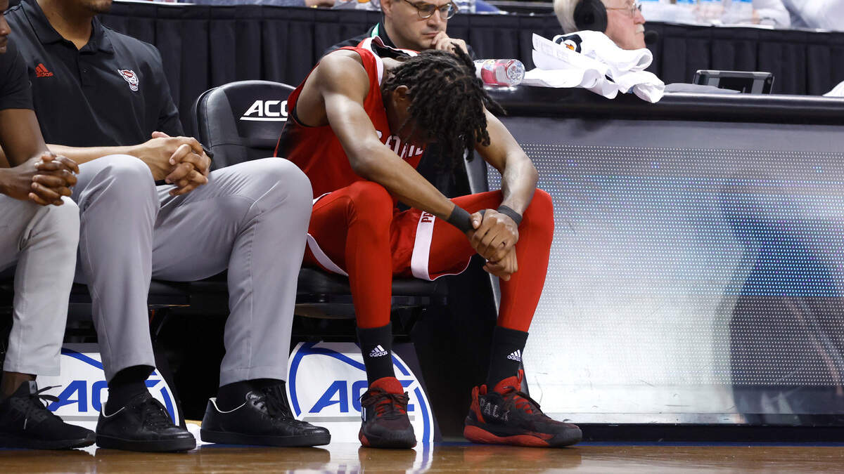 N.C. State’s Terquavion Smith (0) sits on the bench during the second half of Clemson’s 80-54 victory over N.C. State in the quarterfinals of the ACC Men’s Basketball Tournament in Greensboro, N.C., Thursday, March 9, 2023.
