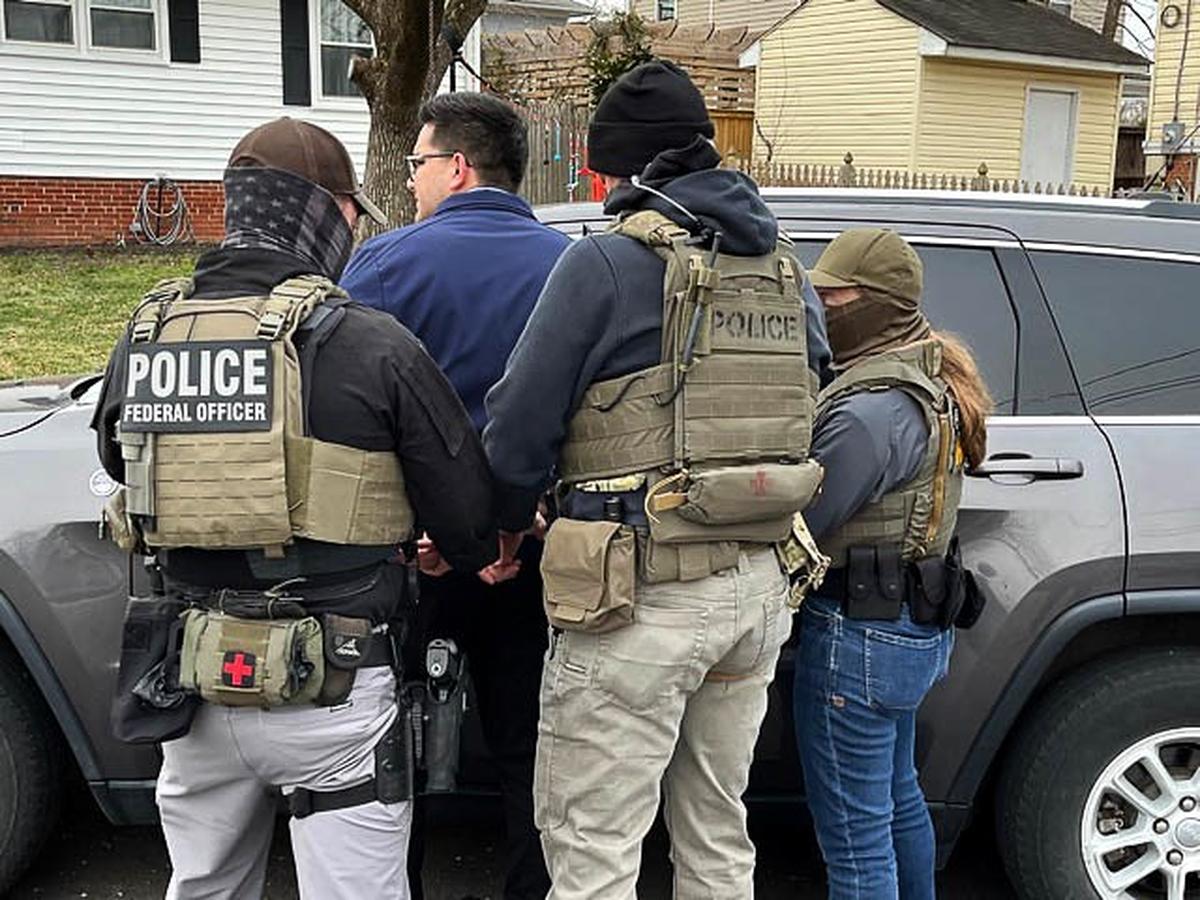 An ICE enforcement team arrests an immigrant in Arlington, Virginia, on Tuesday, Feb. 11, 2025. ICE officers are working with multiple federal agencies, including Homeland Security Investigations, the FBI and the Bureau of Alcohol, Tobacco, Firearms and Explosives.